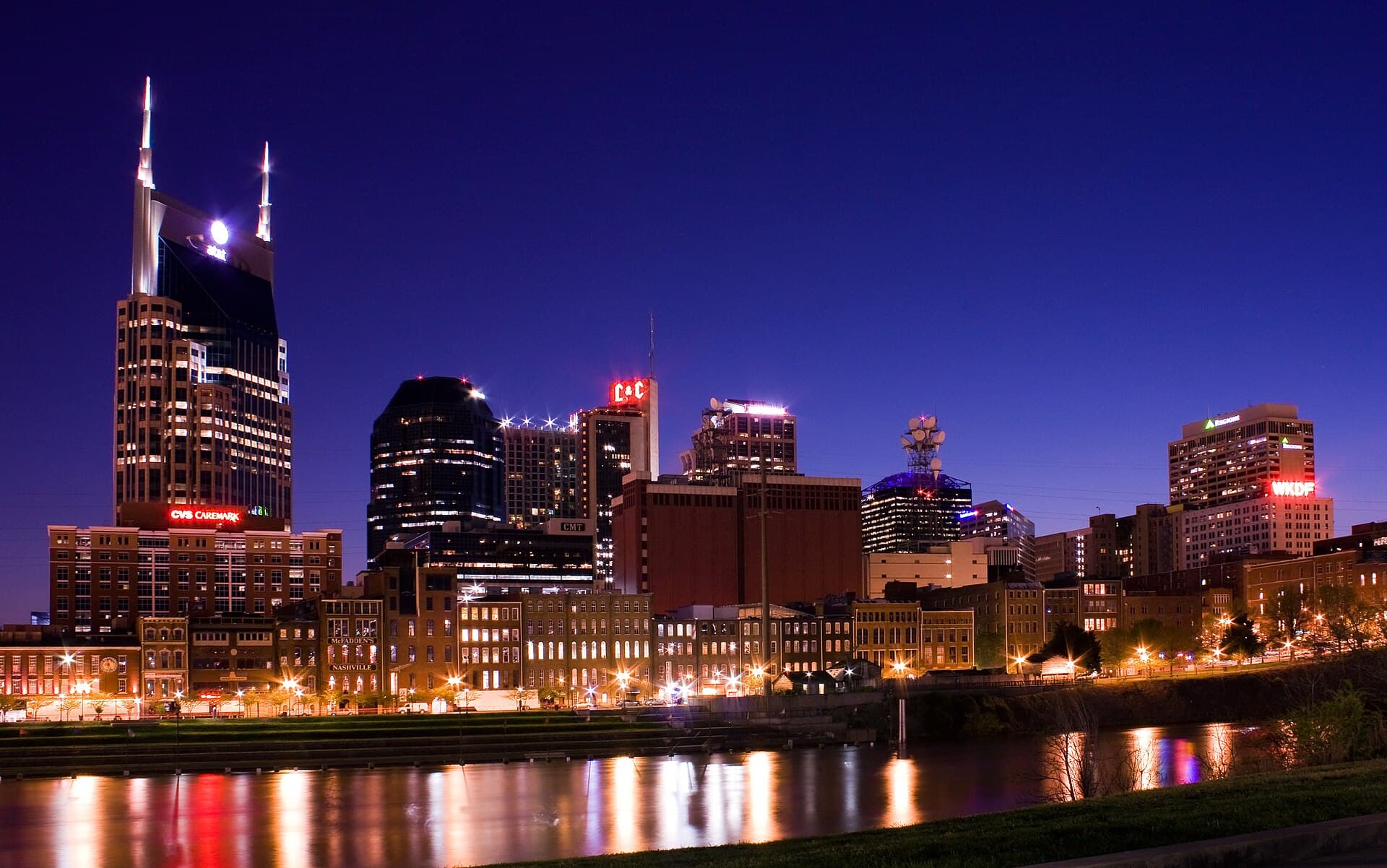 Downtown Nashville skyline at dusk, reflected in the Cumberland River